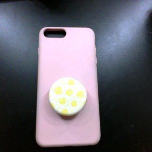 Pink IPhone 8+ case with a Burts Bees Chapstick Popsocket